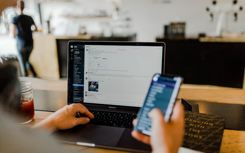 Professional using mobile devices for digital collaboration